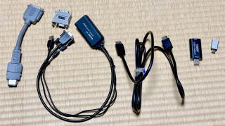 Proprietary Apple dongle, DB15 to VGA dongle, VGA to HDMI dongle, HDMI cable, HDMI to USB capture plug, USB A to USB C dongle