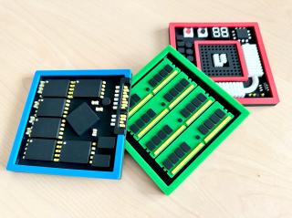 Drink coasters in the shape of an SSD, RAM chips and a CPU socket 