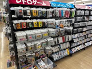 Racks of bagged famicom and Super Famicom games.