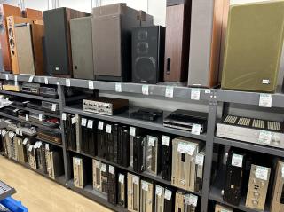 Shelves full of amps and large speakers