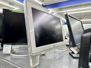 An Apple Cinema Display LCD M8149 on a rack with other LCD displays 