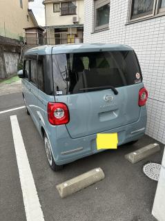 A turquoise small kei hatchback car with the Daihatsu logo and the emblem CANBUS