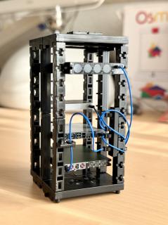 The rear of the toy network rack revealing the cable management