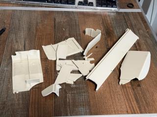 A bunch of shards of beige plastic