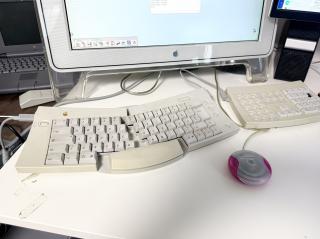 An Apple Adjustable Keyboard that has been split apart