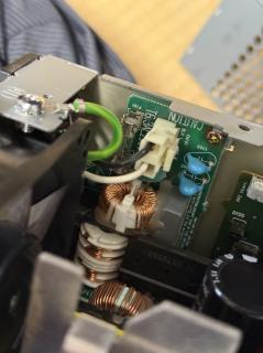 Close up of a line voltage fuse inside a power supply