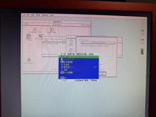 A photo of an LCD screen but the image is all washed out and squished to one side