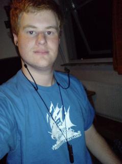 Some little kid wearing one of the first generation Bluetooth A2DP earbuds
