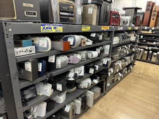 Shelves full of small boomboxes