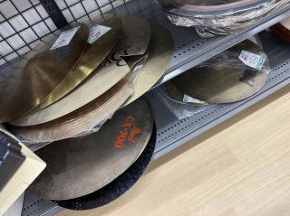 Piles of cymbals