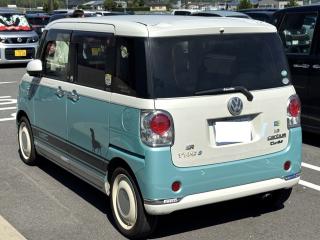 The rear of a kei car with a VW emblem that sticks out suspiciously. There are also a range of emblems on the back: dR, Type 3, 1.3, canbus, turbo, pirelli