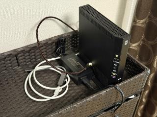 The router stood up and connected to some wires going nowhere awaiting the fiber ONU