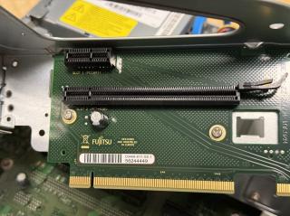 A PCIe riser that says DESIGNED AND ASSEMBLED IN EUROPE