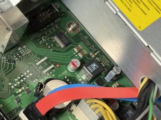 A PC logic board that says “DESIGNED AND ASSEMBLED IN EUROPE”