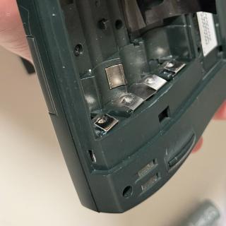Close up of Newton battery terminals either some small spots of teal