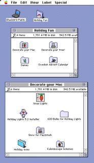 A screenshot of System 7 with two windows open.One is title Holiday Fun and has icons for Decorate your Mac, Decorate your tree, Games and Swedish Advent CalendarOne is titled Decorate your Mac and has icons for Xmas lights, Snow, Holiday Icons and Kaleidoscope Schemes